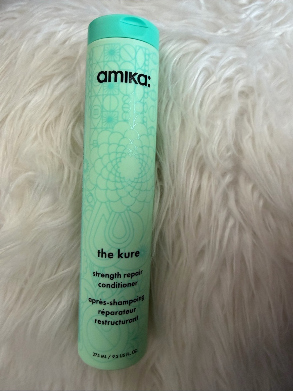 amika mint green hair treatment tube
